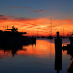 Nantucket sunset over the water with orange sky