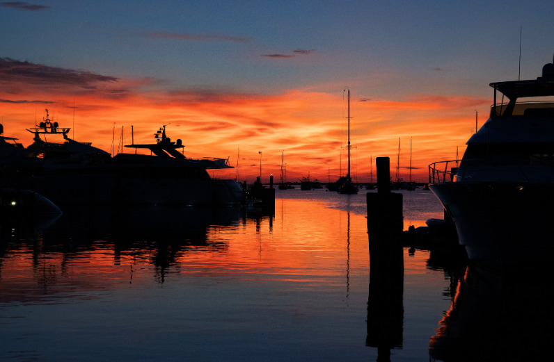 Nantucket sunset over the water with orange sky